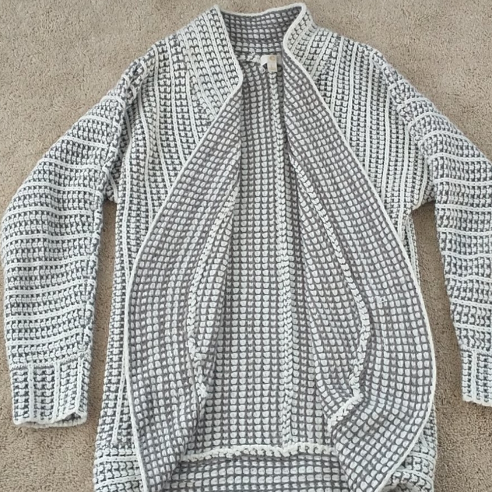 grey and white knit cardigan